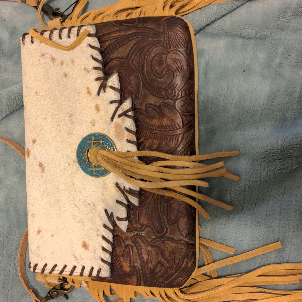 P & G Collection Cowhide Leather Fringe Crossbody Handbag. New with the tag